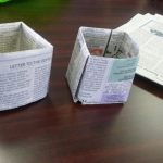 Newspaper planters made with local students